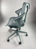 Кресло Herman Miller Cosm, низкая спинка, цвет Glacier, подлокотники «лепестки» (Leaf)