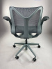 Кресло Herman Miller Cosm, низкая спинка, цвет Glacier, подлокотники «лепестки» (Leaf)